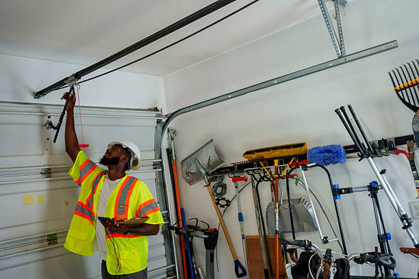 Professional Garage Door technician working in South St. Paul, MN